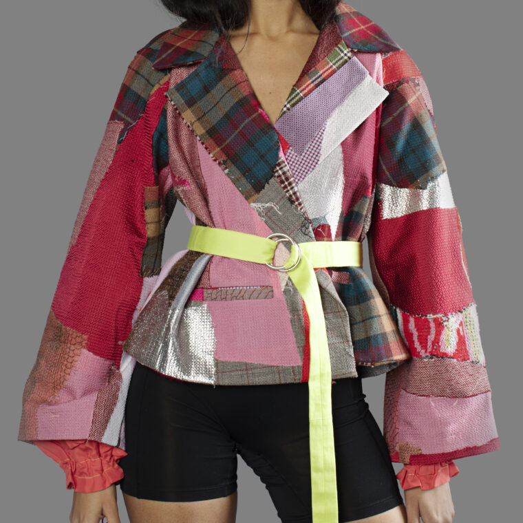 This is an image of a scrap suit jacket from the brand MiJA. It consists of mix of designer fabric leftovers.