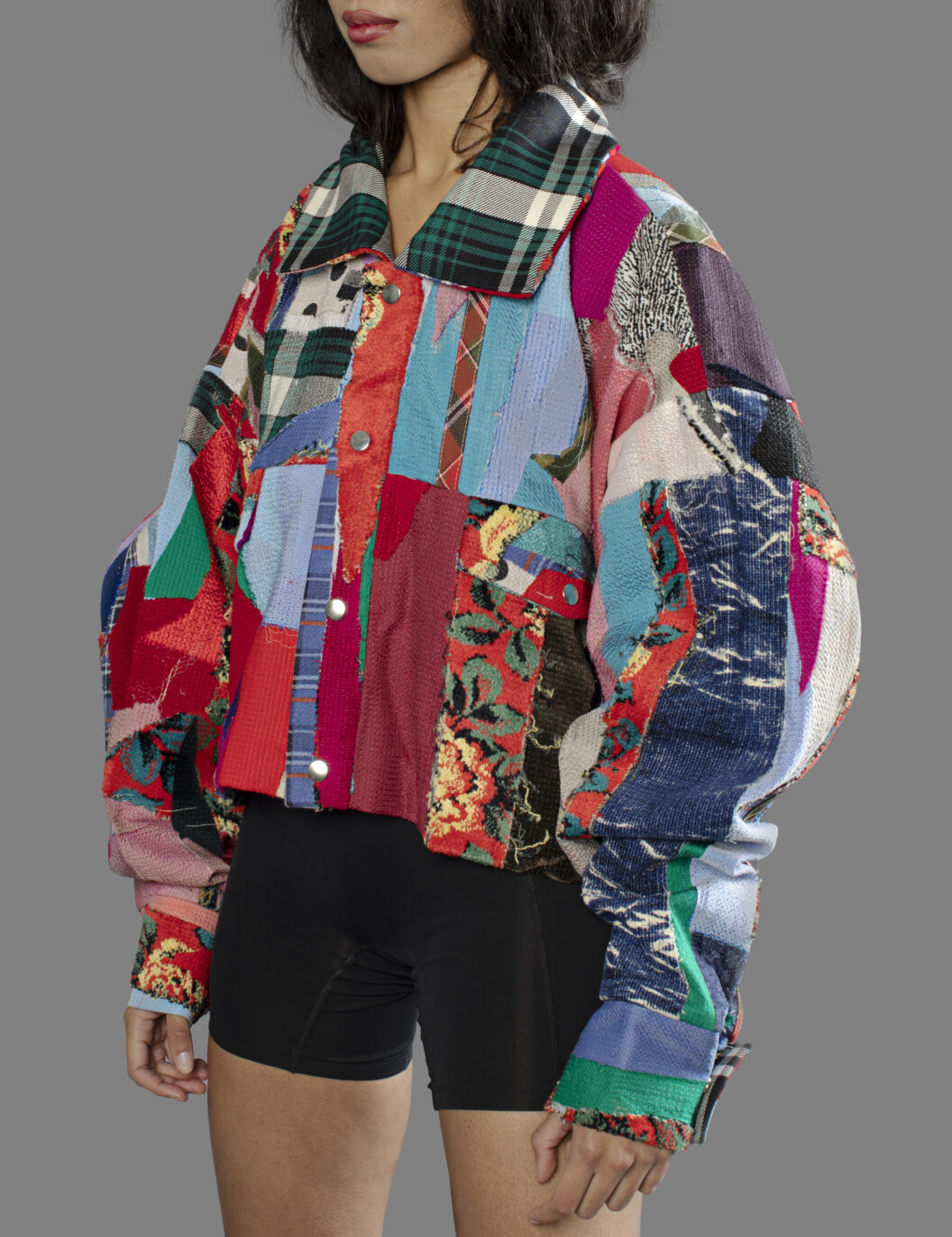 This is an image of a scrap jacket from the brand MiJA. It consists of different colors and materials.