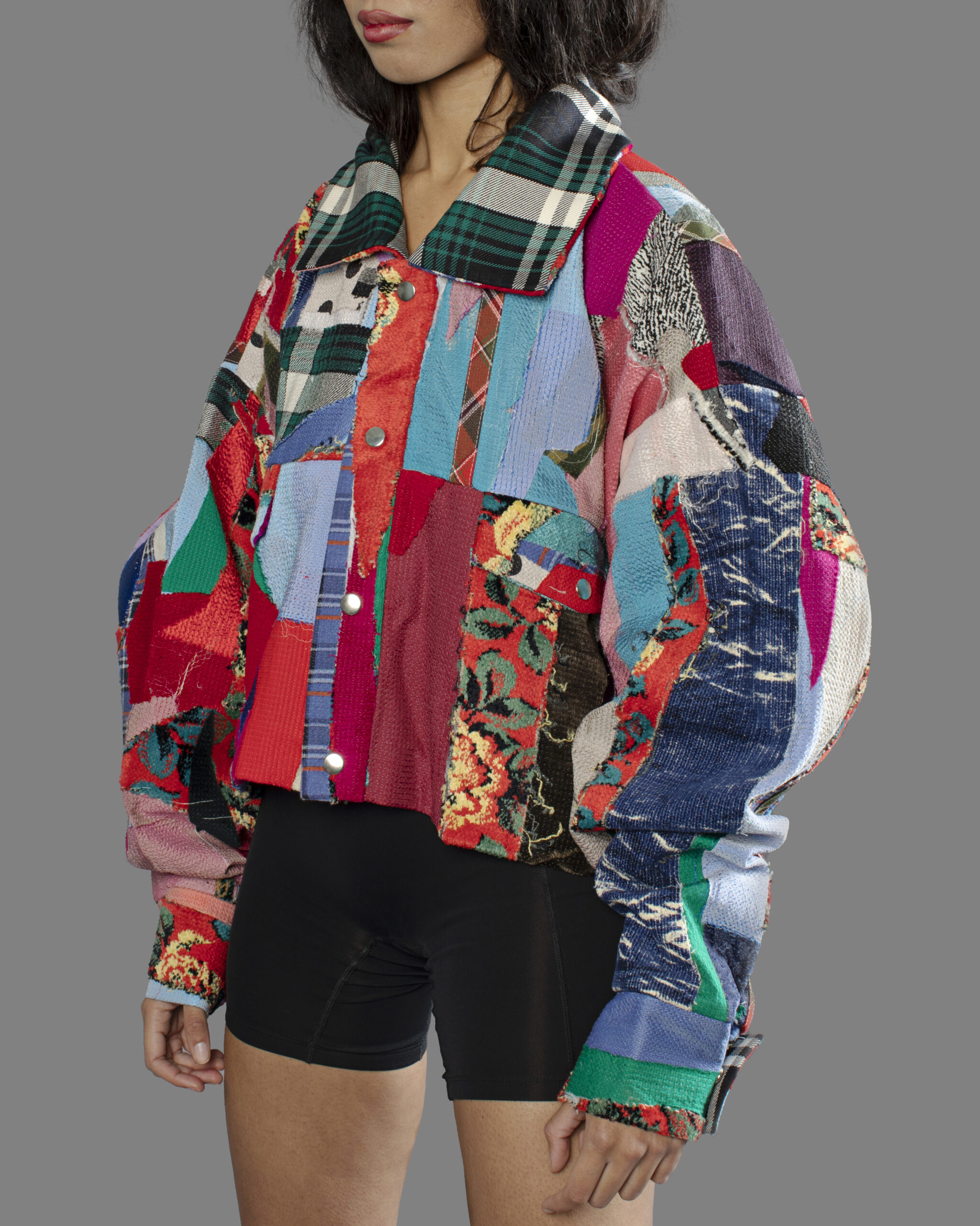 This is an image of a scrap jacket from the brand MiJA. It consists of different colors and materials.