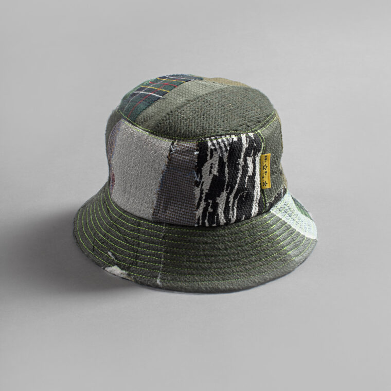 This is an image of a white scrap bucket hat which was made from fabric waste.