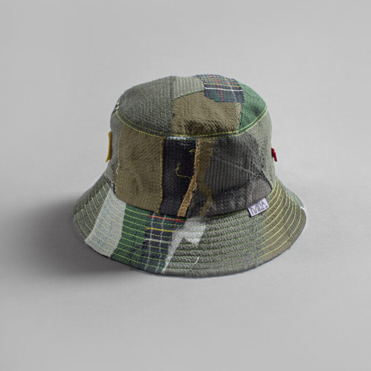 This is an image of a white scrap bucket hat which was made from fabric waste.