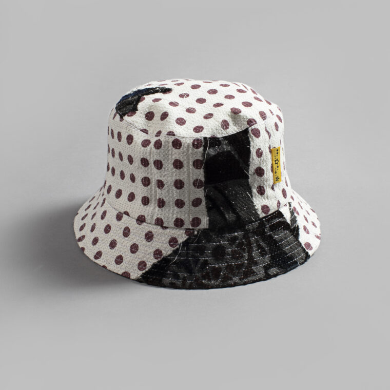 This is an image of a white scrap bucket hat which was made from fabric waste.