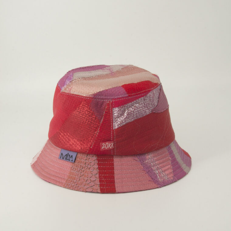 This is an image of a white scrap bucket hat which was made from fabric waste.
